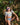 Bikini Moras Lila estilo bubble con mangas cortas y calzón reversible, mostrado por una niña al aire libre en la naturaleza.