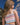Detalle de top fruncido en bikini infantil con tiras ajustables
